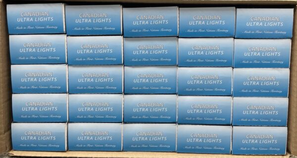 Canadian Ultra Lights cigarette boxes stacked in a display box.