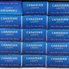 Canadian Lights cigarette packs stacked in a store, highlighting Canadian cigarette brands.