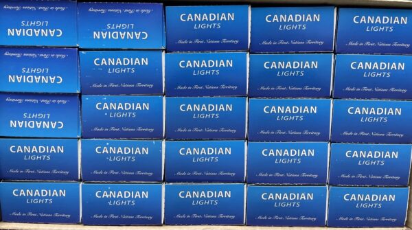 Canadian Lights cigarette packs stacked in a store, highlighting Canadian cigarette brands.